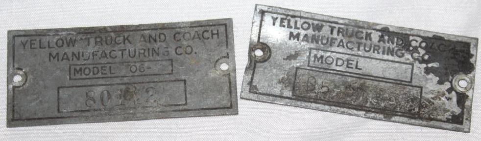 Group of 2 Yellow Truck and Coach Serial Data Tag Emblems (1 of 2)