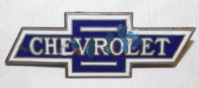 1928 Chevrolet Radiator Emblem Badge: 3" x 1", Cloisonne, with some touch ups