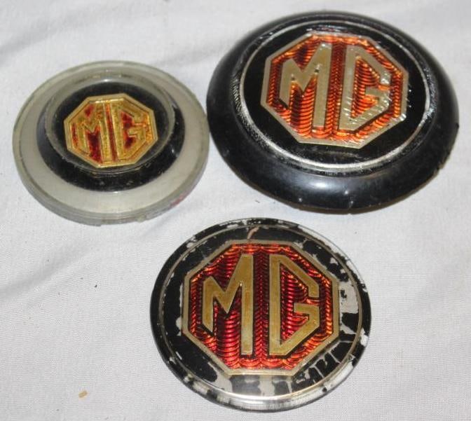 Group of 3 MG Horn Button Emblem Badges: largest 3.5" diameter