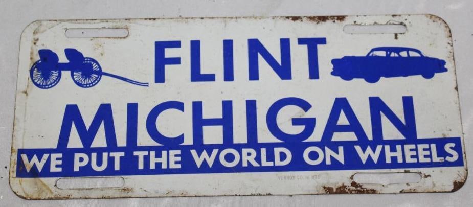 1950's Flint Michigan "We Put the World on Wheels" Booster Plate: 12" x 5.25"