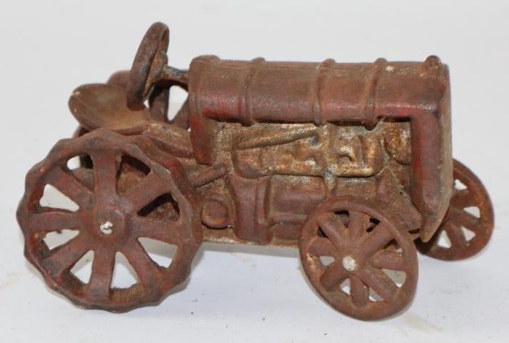 Cast Iron Toy Tractor: The axles have been replaced. 6" x 3" x 4"