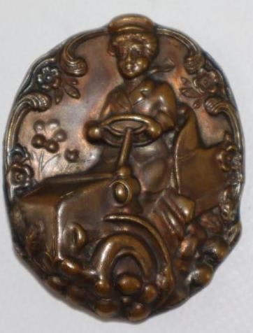 Figural Brass Button w/ Woman Driving Early Car (1 of 2)