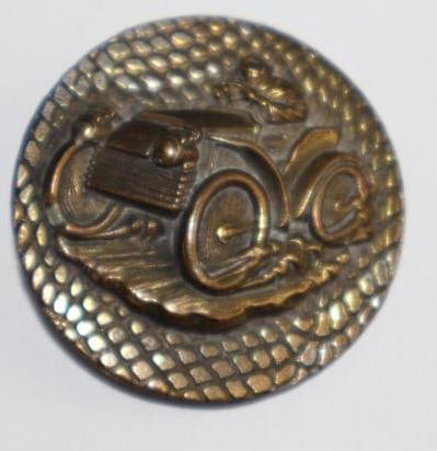 Figural Button of Man Driving Early Car (1 of 2)