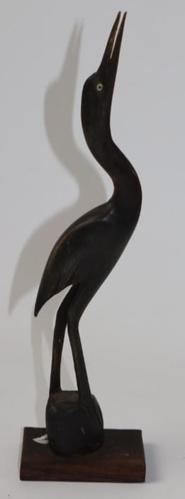 Standing Crane Bird Mascot: It is made of carved wood. 10" x 3" x 1.5"