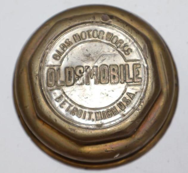 Oldsmobile Olds Motor Works Brass Automobile Threaded Hubcap: 3" diameter