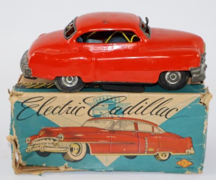Tin Musical Cadillac Battery Operated Toy. Tin Musical Cadillac Battery Operated Toy.