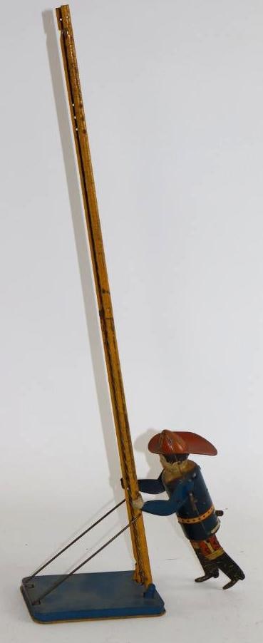 1930's Louis Marx Wind Up Fireman Ladder Climber (1 of 3)