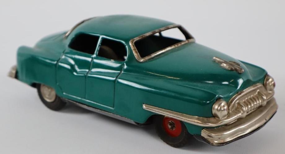 Tin Marusan Cadillac Friction Toy Car.