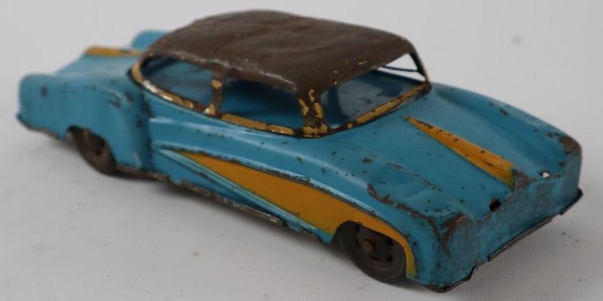 1950's -1960's Blue Sedan Hand Driven Tin Toy Car (1 of 3)