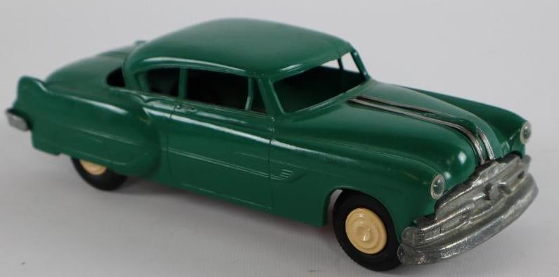 1950's -1960's Green Coupe Wind Up Friction Toy Car: 8" car body is plastic & friction mechanism is missing