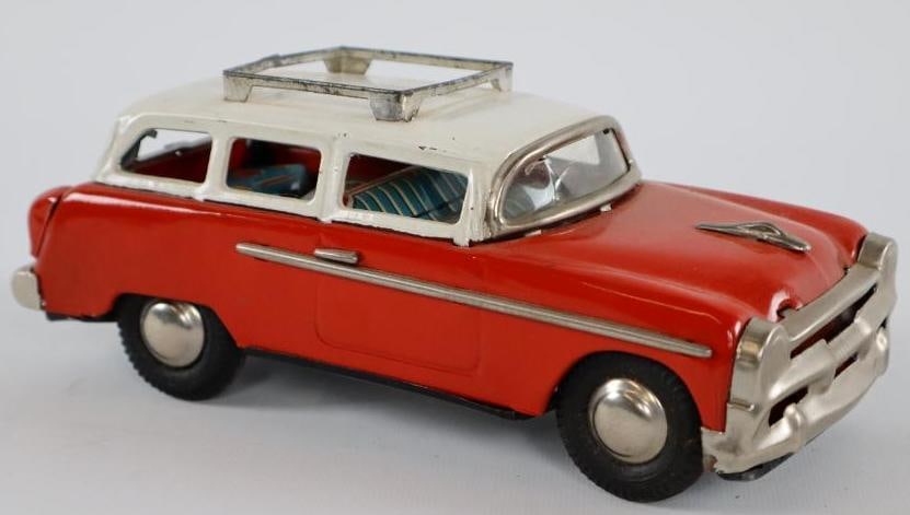 1950's -1960's Yoshi Red Station Wagon Friction Tin Toy Car From Japan: 7.75" has roof rack, rear tail gate opens & luggage is included