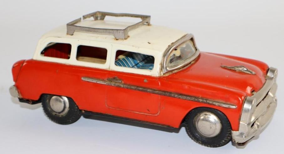 1950's -1960's Yoshi Red Station Wagon Friction Tin Toy Car From Japan: 7.75" has roof rack, rear tail gate opens