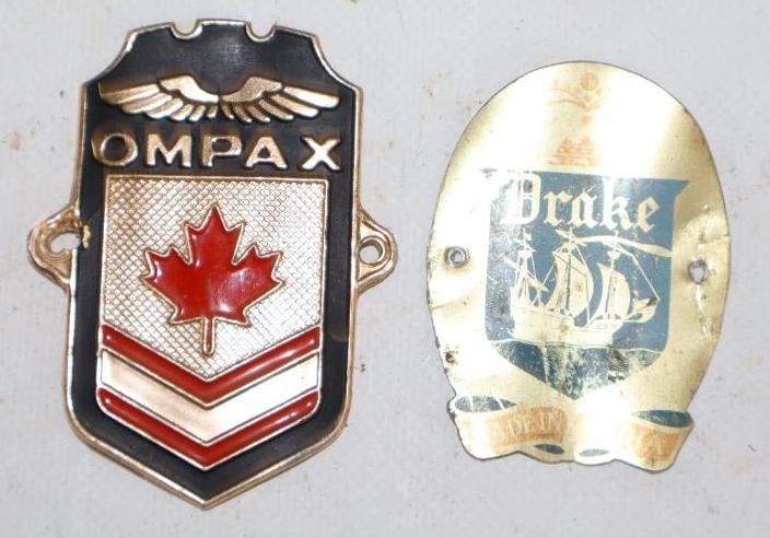Group of 2 Drake & Ompax Bicycle Head Badges: largest 2" x 2.75"
