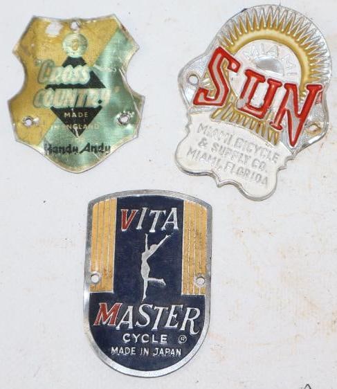 Group of 3 Sun, Cross Country, Vita Master Bicycle Head Badges: largest 2" x 2.5"