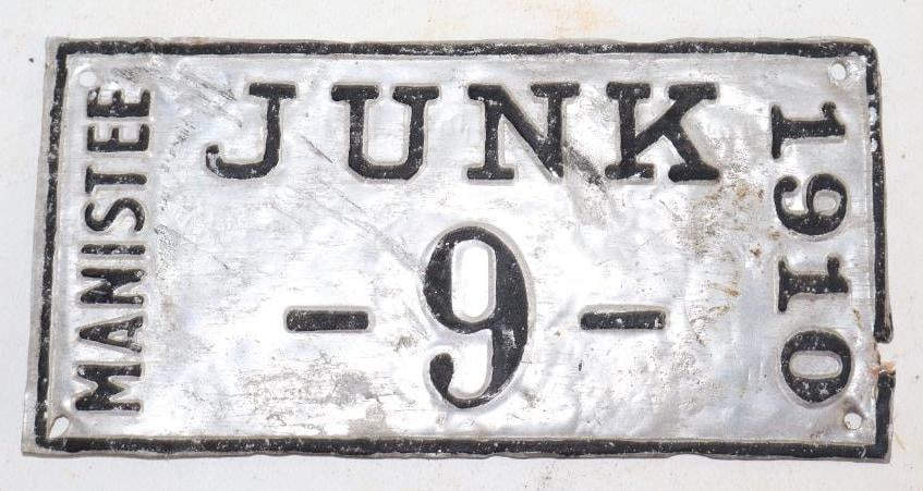 1910 Manistee Michigan Junk Dealer Aluminum License Plate: 7.75" x 3.75"