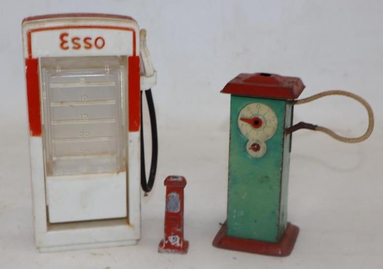 Group of 3 Gas Pump Tin And Plastic Toys: 6.50" x 3.50" x 2" largest