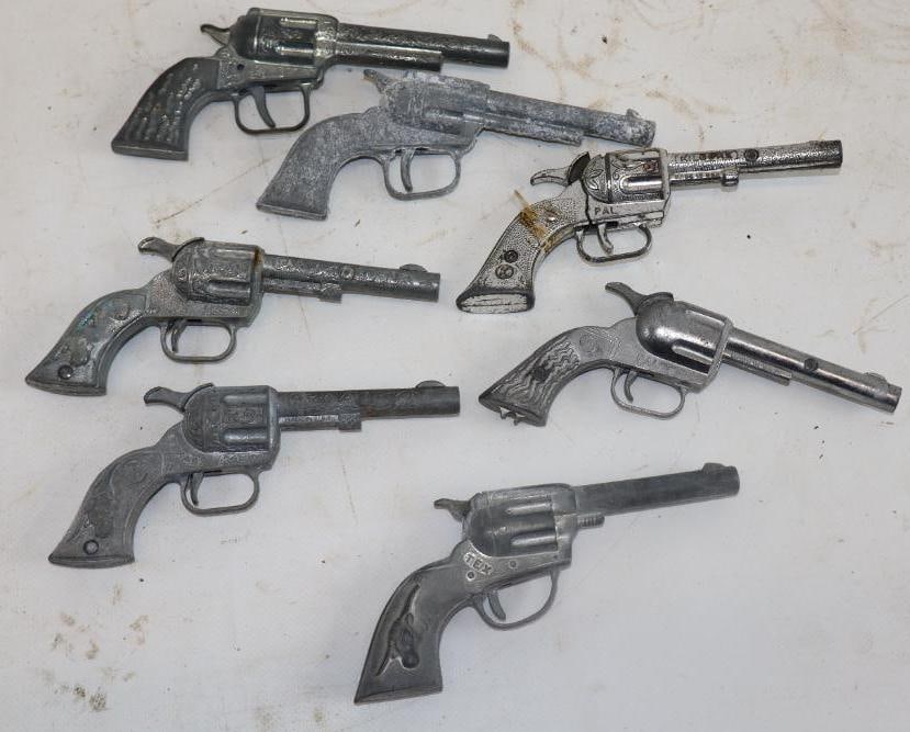 Group of 7 Pal Toy Cap Guns: 5.50" x 2.50" x.75" largest