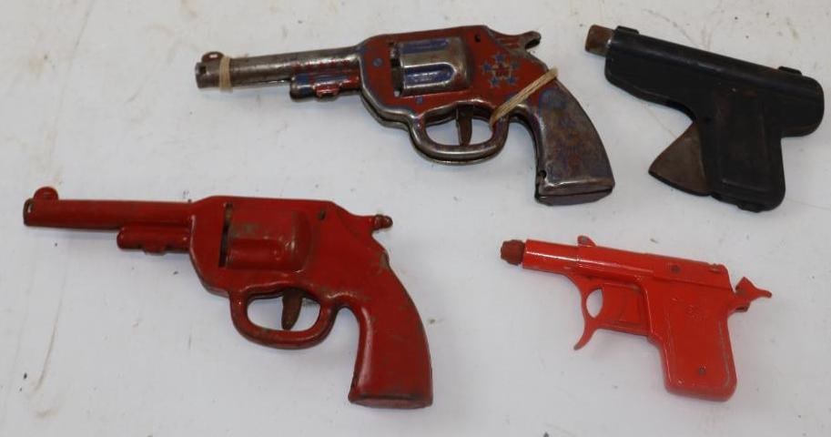 Group of 4 Different Press Steel Toy Guns (1 of 2)