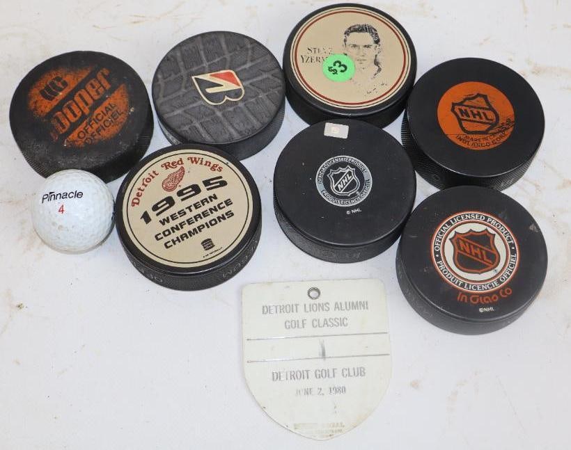 Group of 9 Hocky Pucks Detroit Lions Alumni Gulf Classic Tag And Wayne County Golf Ball: 3.25" x 3" largest