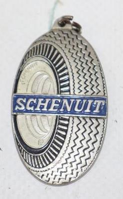 Schenuit Tires Advertising Charm: 1" x 1.50"