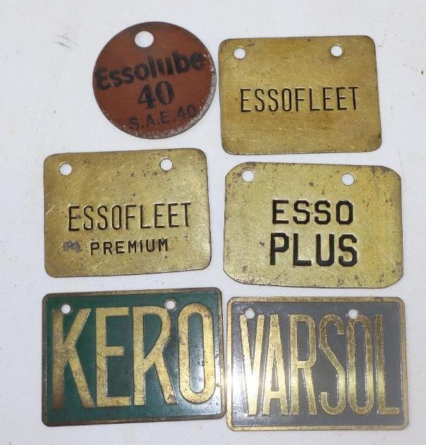 Group of 6 Esso Brass And Masonite ID Tags: 2.75" x 2" largest