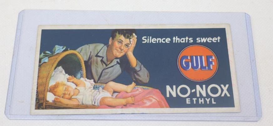 GULF NO-NOX ETHYL GASOLINE ADVERTISING INK BLOTTER.: 6" X 3". CONDITION: BRILLIANT CONDITION WITH NO NOTABLE FIELD WEAR AND ONLY LIGHT EDGE WEAR SHOWING DETAILED DAD & BABY GRAPHIC WITH SILENCE THATS SWEET SLOGAN.