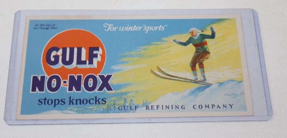 GULF NO NOX GASOLINE ADVERTISING INK BLOTTER WITH SKIER GRAPHIC.: 6" x 3". CONDITION: BLOTTER WAS FOUND N.O.S. AND IN BRILLIANT CONDITION WITH NO NOTABLE FIELD WEAR AND ONLY LIGHT EDGE WEAR SHOWING DETAILED SKIER GRAPHIC WITH FOR WINTER SPORTS SLOGAN. MARKED LITHO I