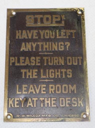 ORIGINAL BRASS HAVE YOU LEFT ANYTHING HOTEL ROOM REMINDER SIGN.: 3.25" X 2.25". MAKER MARKED WILCOX MANUFACTURING. C. 1920'S STAMPED BRASS HOTEL ROOM REMINDER SIGN. CONDITION: EXCELLENT ORIGINAL PATINA THROUGHOUT THE FIELD WITH MINRO WEAR AT THE MOUNTING HOLES AND 