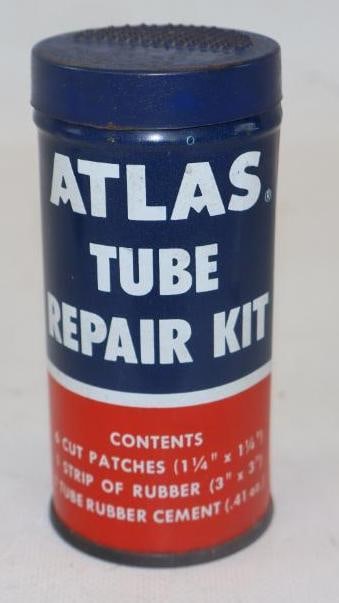 ATLAS TIRES TUBE REPAIR KIT CAN.: 4.25" 1950'S TIRE REPAIR KIT FROM ATLAS TIRES SOWING RED WHITE & BLUE COLORS. CONDITION: OVERALL EXCELLENT SHOWING JUST A FAINT ABOUT OF SURFACE WEAR WITH EXCELLENT COLOR & GLOSS THROUGHOUT.