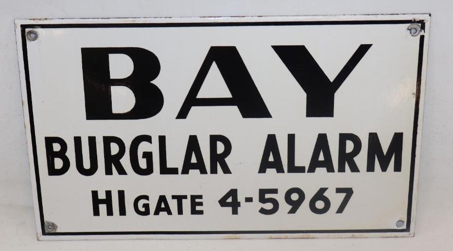 BAY BURGLAR ALARM PORCELAIN SIGN.: 13.5" X 8" 1950'S SINGLE SIDED PORCELAIN SIGN FOR BAY BURGLAR ALARMS. CONDITION: EXCELLENT COLOR & GLOSS WITH VERY MINIMAL WEAR AT MOUNTING HOLES AND AT OUTER EDGE. A BRIGHT AND GLOSSY EXAMPLE.