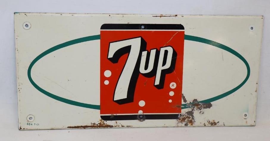 SEVEN UP SODA POP TIN SIGN.: 20" X 9.5". SINGLE SIDED TIN, DATED 1961. CONDITION: EXCELLENT COLOR & GLOSS THROUGHOUT WITH PAINT LOSS AND SCRATCHING AT LOWER BUT SHOWS A CLEAN GRAPHIC. SIGN SHOWS A SELF FRAMED STYLE OUTER EDGE WIT