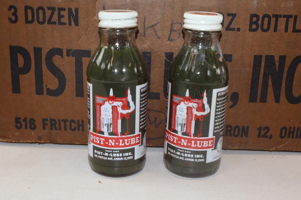 Group of 18 Pist-N-Lube Glass Oil Bottles w/ Original Box (1 of 2)