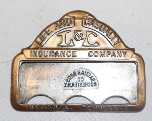 Life And Causality Insurance Company Embossed Bronze Name Badge: 2" x 1.75"
