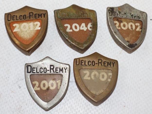 Group of 5 Delco-Remy Employee Pin Back Badges: 1" x 1" each