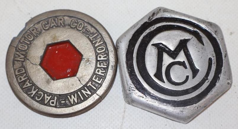 Group or 2 Packard And Chalmers Automobile Hubcap Emblems: 2.25" x 2.25" each, both have been cut