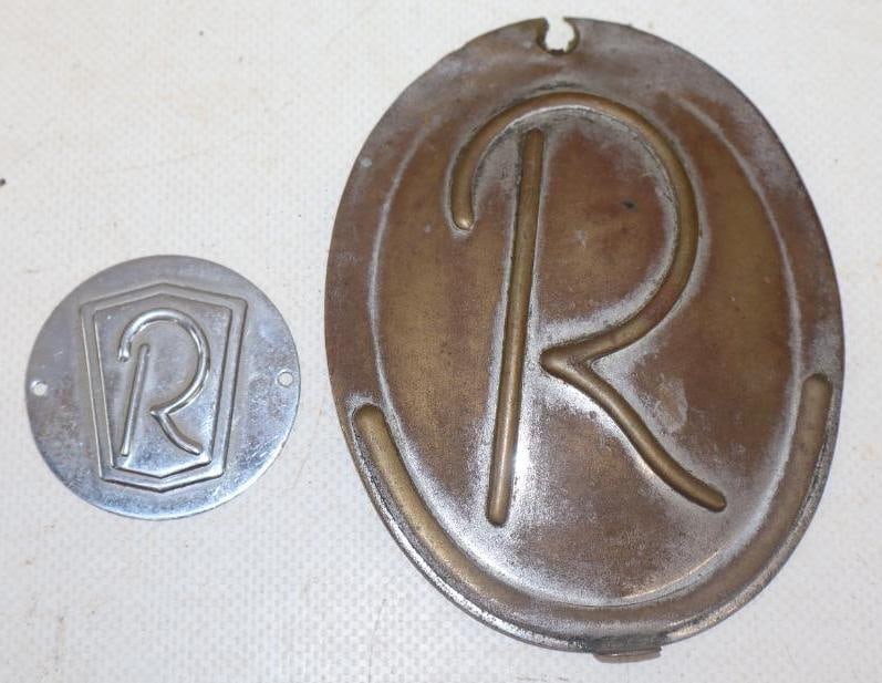 Group of 2 Studebaker Roosevelt Motor Car Co. Hubcap Emblems: 4" x 3.25" largest