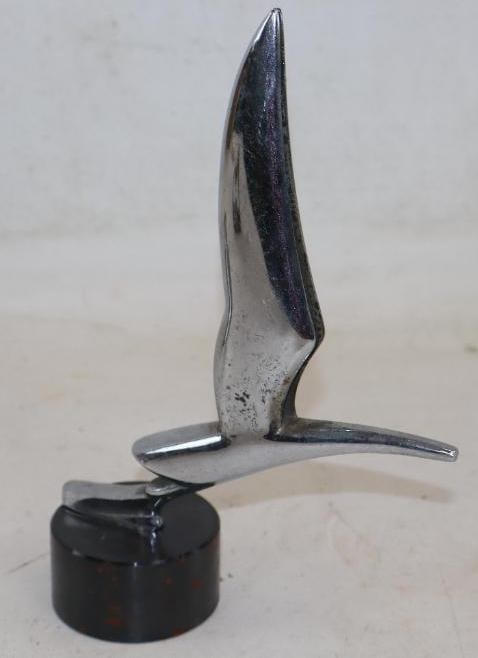 Stylized Bird Radiator Mascot Hood Ornament: 6" x 2.50" x 9.25" mounted to lead base, the front has been trimmed