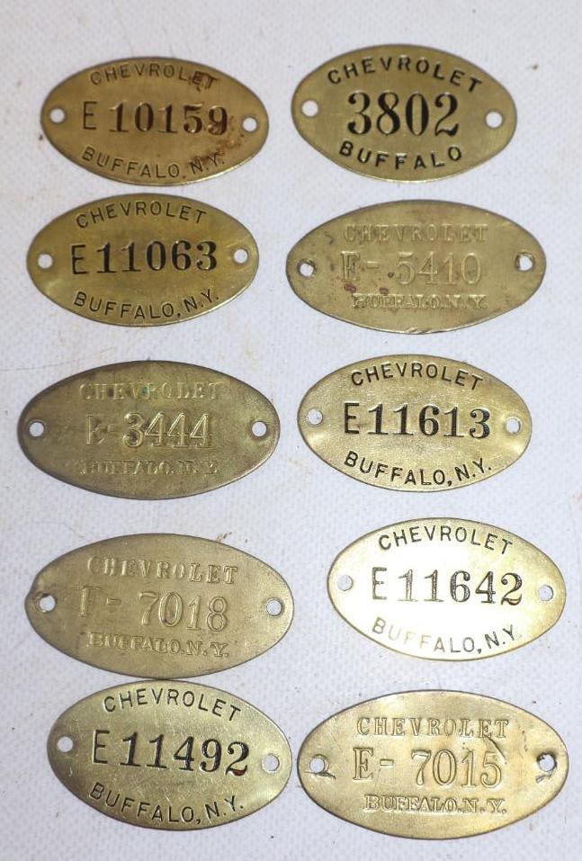 Group of 10 Chevrolet Brass Tags: 2.25" x 1.50" largest