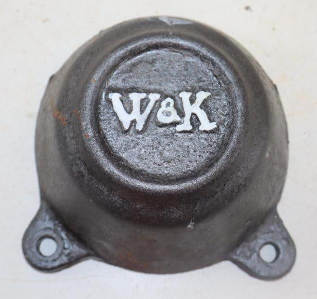 W & K Cast Steel Automobile Hubcap: 7" diameter 2 mounting holes broken off