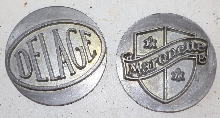 Group of 2 Marquette And Delage Cast Hubcap Badge Emblems: 2.50" diameter each