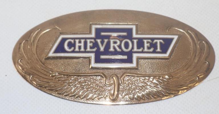1928 Chevrolet Plate and Emblem: 4.5" x 2.25", cloisonne, there is damage to the enamel