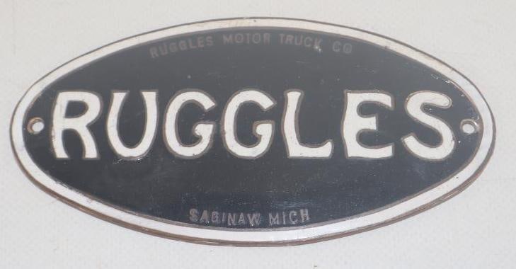 1924 - 1928 Ruggles (large) Saginaw MI Radiator Emblem Badge: 5" x 2.5", cloisonne. There are some professional touch-ups in the black areas.