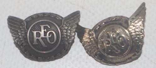 Pair of REO light Emblem Badges: 1" x .5" each