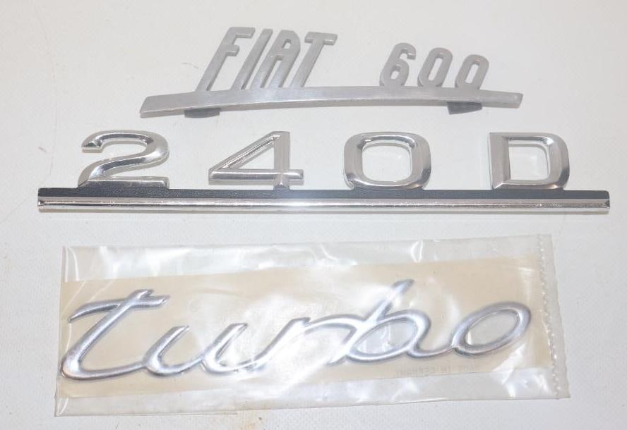 Group of 3 Porshe Turbo, Mercedes 240D And Fiat 600 Fender Emblems: 9" long largest Turbo is NOS