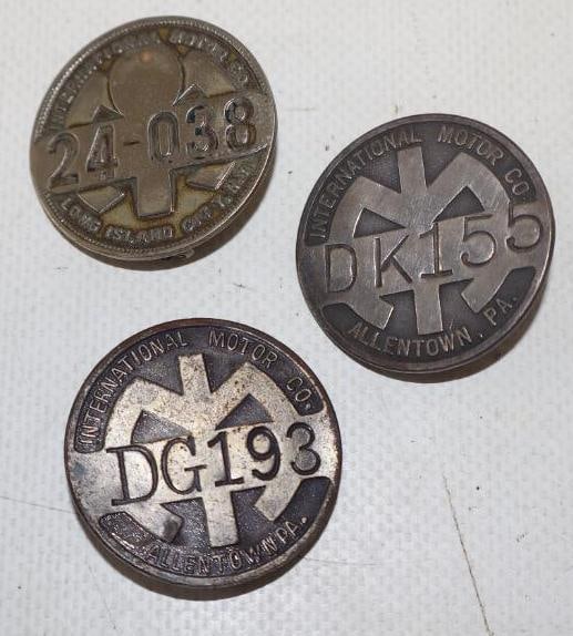 Group of 3 International Motor Co Employee Pin Back Badges: 1.75" diameter each