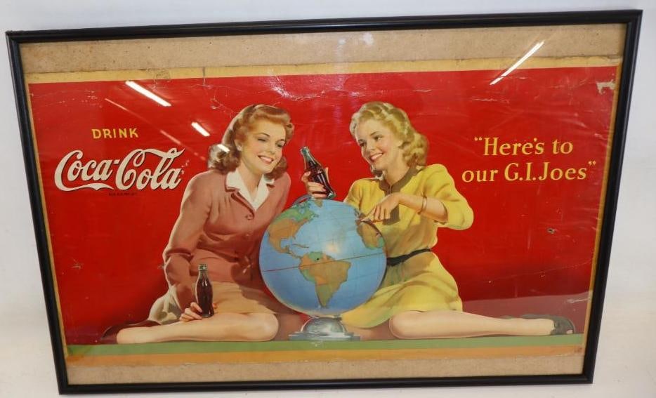 1944 Coca-Cola Graphic Cardboard Sign: This sign shows vibrant colors and is marked 1944 Snyder & Black Inc. There is some water stains along the outer edges and some slight creases and tears near the edges. It is 20" x 36" and is graded 7