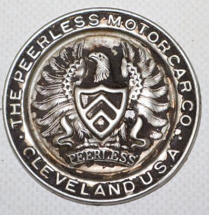1923-30 Peerless Motor Car Co Embossed  Hubcap Emblem (1 of 2)