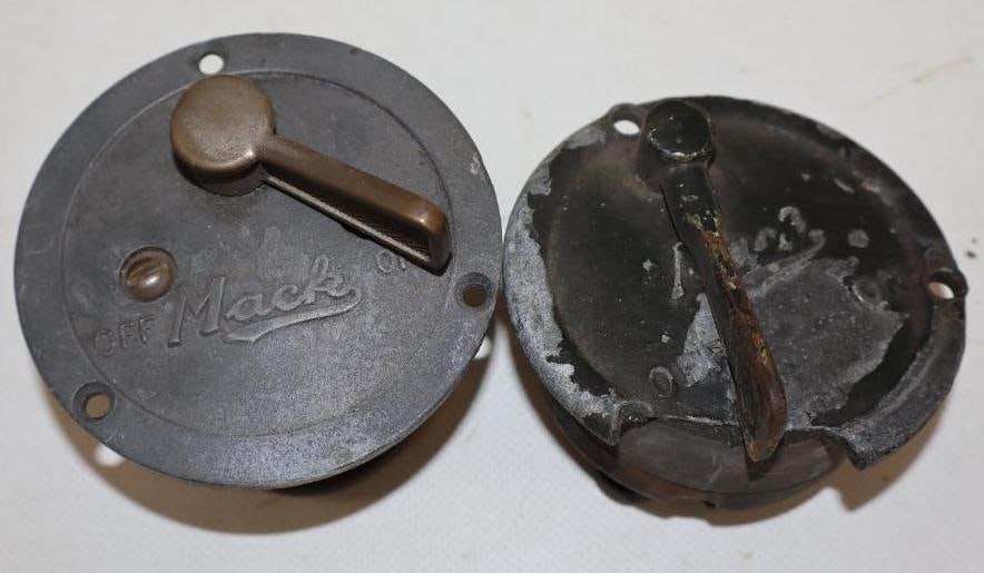 Group of 2 Early Mack Truck Ignition Switches: 3.25" diameter each 1 switch is chipped around edge