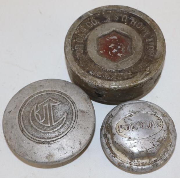 Group of 3 Pontiac, Packard And Chrysler Threaded Automobile Hubcaps: largest is 4.50" diameter