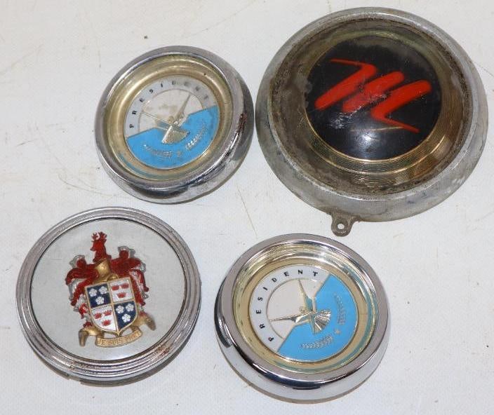 Group of 4 Kaiser-Fraser, Studebaker And Nash Metropolitan Horn Buttons: largest is 5" diameter